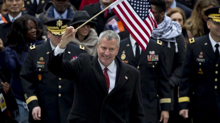 Mayor Bill de Blasio marches in the 96th annual New York City Veterans Day Parade in lower Manhattan on Wednesday, Nov. 11, 2015.