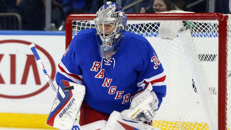 Henrik Lundqvist of the New York Rangers makes a save in the second period against the Carolina Hurricanes at Madison Square Garden on Tuesday, Nov. 10, 2015.