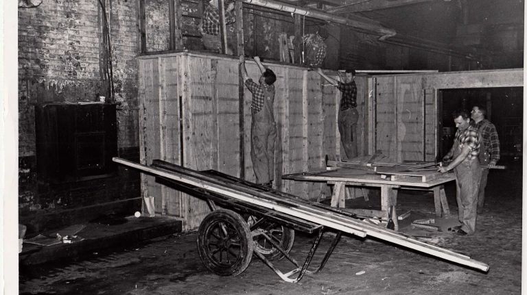 Heartbreaking photos of the demolition of the 1910 Penn Station, construction of Madison Square Garden 30 A team of carpenters create the framework for a new but temporary baggage room during the renovation of Penn Station on April 7, 1964. The former baggage room is set to be demolished as soon as this one is complete.