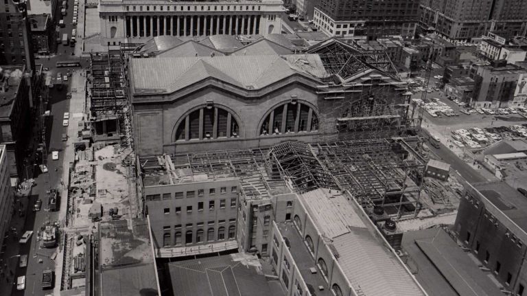 Heartbreaking photos of the demolition of the 1910 Penn Station, construction of Madison Square Garden 33 An overhead view of Penn Station under construction on July 28, 1965 shows a framework of steel scaffolding on the 32nd and 33rd street sides of the building. Engineers hope to have the new station finished by 1967.