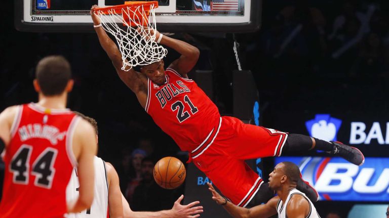 Nets vs. Bulls 22 Jimmy Butler #21 of the Chicago Bulls dunks the ball late in a game against the Brooklyn Nets at Barclays Center on Wednesday, Oct. 28, 2015 in Brooklyn, New York.