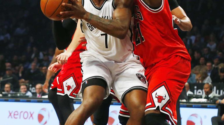 Nets vs. Bulls 28 Joe Johnson #7 of the Brooklyn Nets looks to drive to the basket in the first half against Jimmy Butler #21 of the Chicago Bulls at Barclays Center on Wednesday, Oct. 28, 2015 in Brooklyn, New York.
