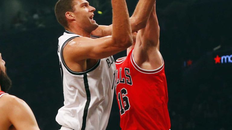 Nets vs. Bulls 34 Brook Lopez #11 of the Brooklyn Nets goes to the hoop for a basket against Pau Gasol #16 of the Chicago Bulls at Barclays Center on Wednesday, Oct. 28, 2015 in Brooklyn, New York.