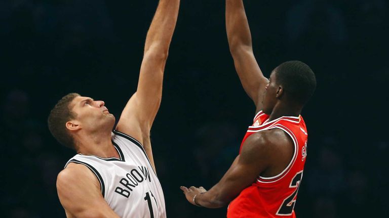 Nets vs. Bulls 42 Brook Lopez #11 of the Brooklyn Nets blocks a shot in the first half against Tony Snell #20 of the Chicago Bulls at Barclays Center on Wednesday, Oct. 28, 2015 in Brooklyn, New York.