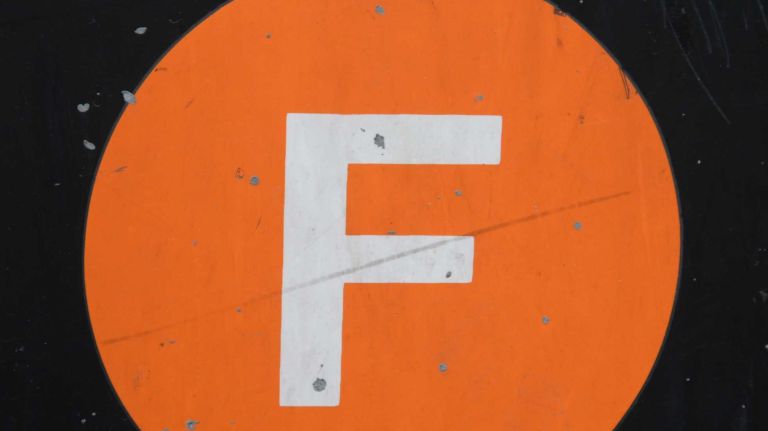 A woman was struck by an F train at Brooklyn's Avenue X station, police said.