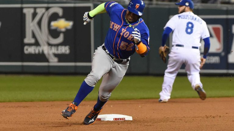 World Series Game 1: Mets vs. Royals 100 New York Mets center fielder Yoenis Cespedes (52) rounds 2nd base on hit by New York Mets first baseman Lucas Duda (21) in sixth inning during Game 1 of the World Series against the Kansas City Royals at Kauffman Stadium on Tuesday, Oct. 27, 2015.