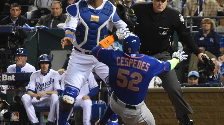 World Series Game 1: Mets vs. Royals 102 New York Mets center fielder Yoenis Cespedes (52) scores on sac fly in the sixth inning on the ball hit by New York Mets left fielder Michael Conforto (30) during Game 1 of the World Series against the Kansas City Royals at Kauffman Stadium on Tuesday, Oct. 27, 2015.