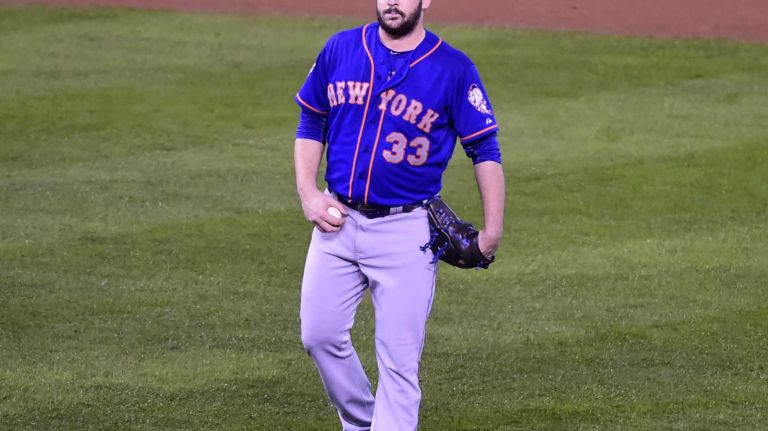 World Series Game 1: Mets vs. Royals 120 New York Mets starting pitcher Matt Harvey (33) reacts after the inside the park homer by Kansas City Royals shortstop Alcides Escobar (2) in first inning during Game 1 of the World Series against the Kansas City Royals at Kauffman Stadium on Tuesday, Oct. 27, 2015.