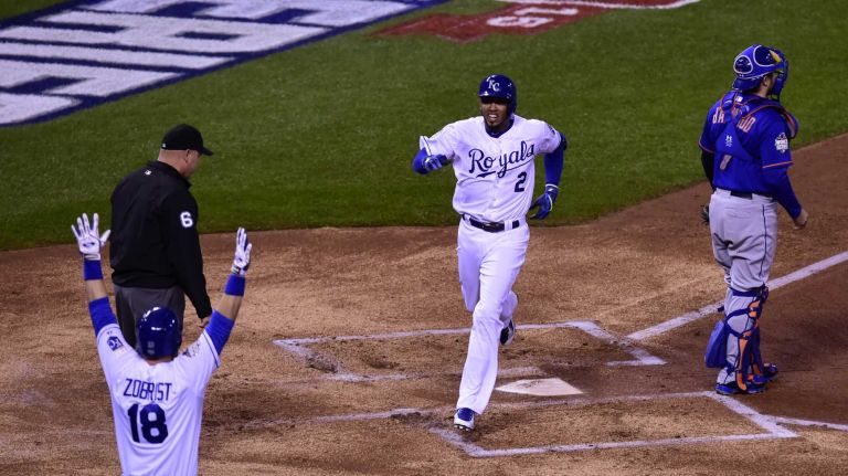 World Series Game 1: Mets vs. Royals 125 Kansas City Royals second baseman Ben Zobrist (18) high fives Kansas City Royals shortstop Alcides Escobar (2) after the inside the park homer during Game 1 of the World Series against the Kansas City Royals at Kauffman Stadium on Tuesday, Oct. 27, 2015.