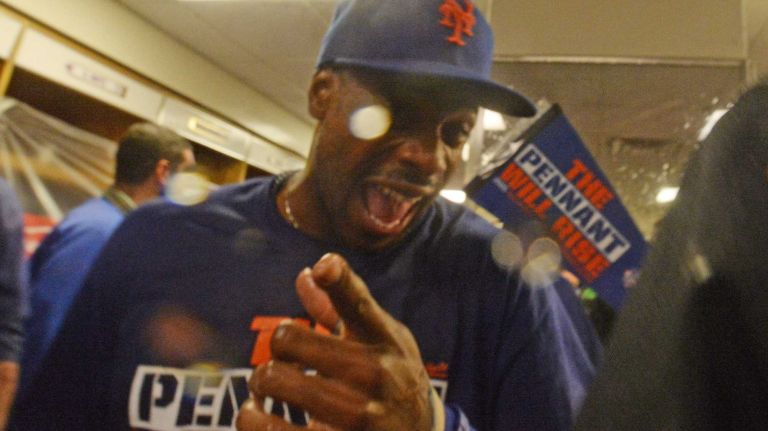 New York Mets rightfielder Curtis Granderson (3) celebrates in the clubhouse after beating the Chicago Cubs in the NLCS at Wrigley Field on Wednesday, Oct. 21, 2015.