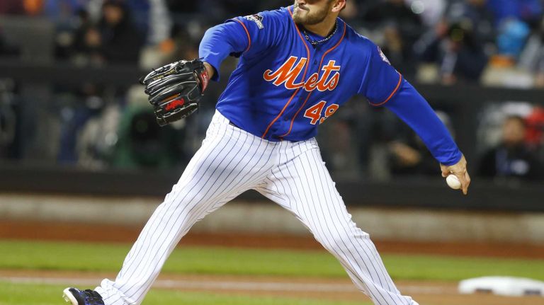 New York Mets starting pitcher Jonathon Niese (49) delivers the pitch in the sixth inning during Game 2 of the NLCS against the Chicago Cubs at Citi Field on Sunday, Oct. 18, 2015.