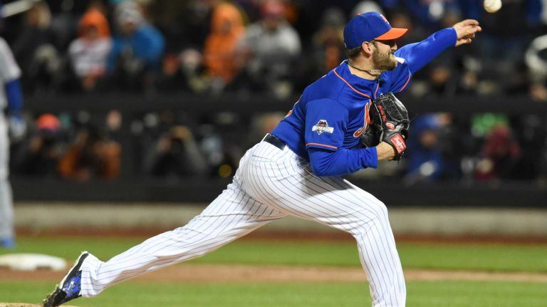 New York Mets starting pitcher Jonathon Niese (49) delivers the pitch in the sixth inning during Game 2 of the NLCS against the Chicago Cubs at Citi Field on Sunday, Oct. 18, 2015.