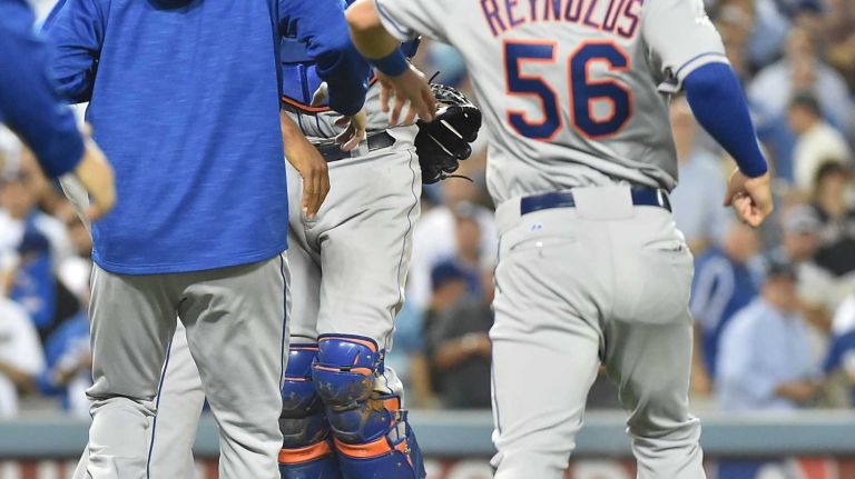 The New York Mets celebrate their National League Division Series victory over the Los Angeles Dodgers at Dodger Stadium in Los Angeles on Oct. 15, 2015.