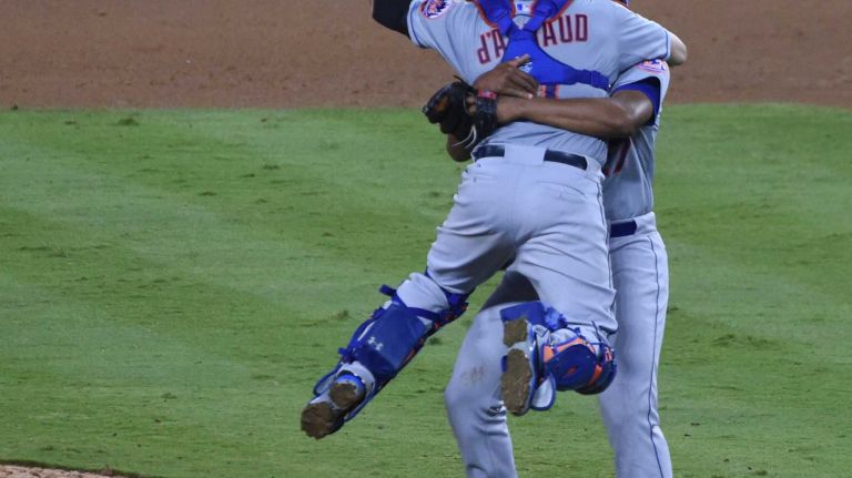 The New York Mets celebrate their National League Division Series victory over the Los Angeles Dodgers at Dodger Stadium in Los Angeles on Oct. 15, 2015.