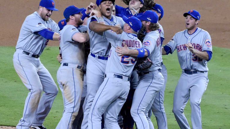 The New York Mets celebrate their National League Division Series victory over the Los Angeles Dodgers at Dodger Stadium in Los Angeles on Oct. 15, 2015.