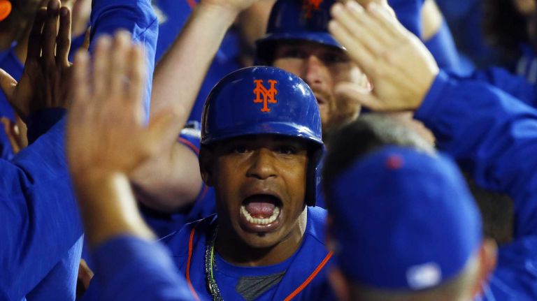 Yoenis Cespedes 12 Yoenis Cespedes #52 of the New York Mets celebrates his fourth inning three run home run against the Los Angeles Dodgers at Citi Field in the Queens during Game 3 of the NLDS on Monday, Oct. 12, 2015