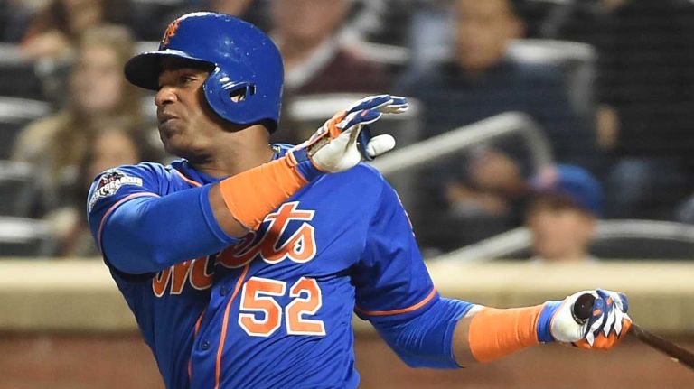New York Mets centerfielder Yoenis Cespedes (52) connects on a single in the third inning during Game 3 of the NLDS against the Los Angeles Dodgers on Monday, Oct. 12, 2015.