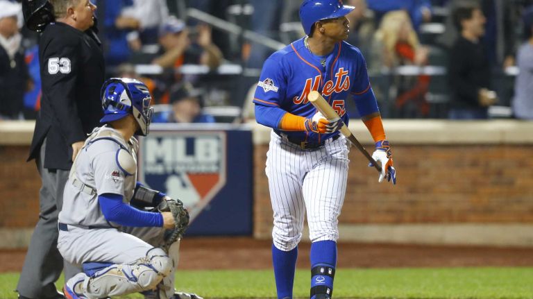 Yoenis Cespedes #52 of the New York Mets watches the flight of his fourth-inning three-run home run during Game 3 of the NLDS against the Los Angeles Dodgers on Monday, Oct. 12, 2015.