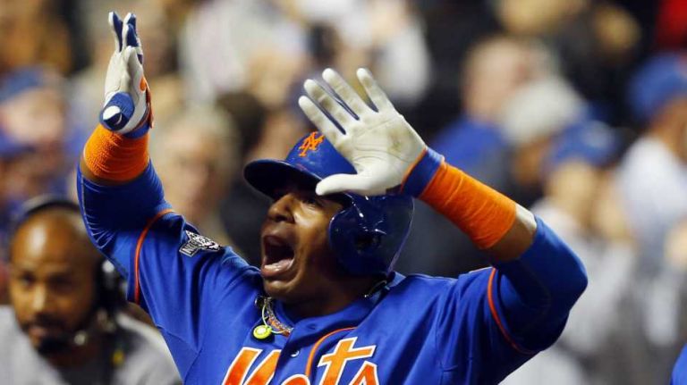 Yoenis Cespedes #52 of the New York Mets celebrates his fourth-inning three-run home run against the Los Angeles Dodgers at Citi Field during Game 3 of the NLDS on Monday, Oct. 12, 2015