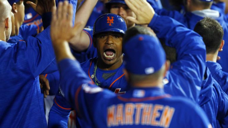 Yoenis Cespedes #52 of the New York Mets celebrates his fourth-inning three-run home run against the Los Angeles Dodgers at Citi Field during Game 3 of the NLDS on Monday, Oct. 12, 2015.