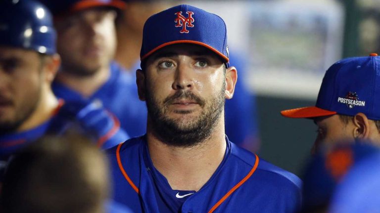 Matt Harvey #33 of the New York Mets walks in the dugout after the second inning against the Los Angeles Dodgers at Citi Field during Game 3 of the NLDS on Monday, Oct. 12, 2015.