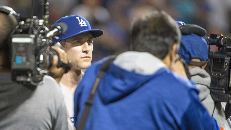 Los Angeles Dodgers infielder Chase Utley looks on during player introductions before the start of Game 3 of the NLDS at Citi Field on Monday Oct. 12, 2015.