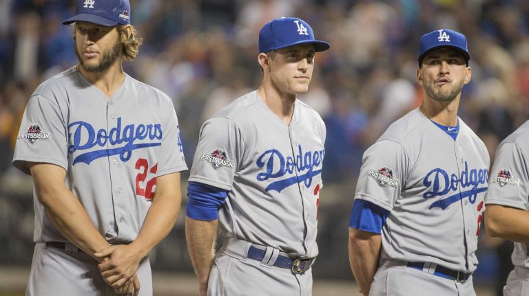 Los Angeles Dodgers infielder Chase Utley looks on during player introductions before the start of Game 3 of the NLDS at Citi Field on Monday Oct. 12, 2015.