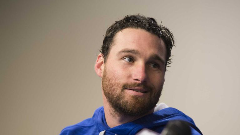 New York Mets second baseman Daniel Murphy (28) speaks to the media during the pregame press conference before the Mets took on the Dodgers at Citi Field in Game 3 of the NLDS on Monday, Oct. 12, 2015.