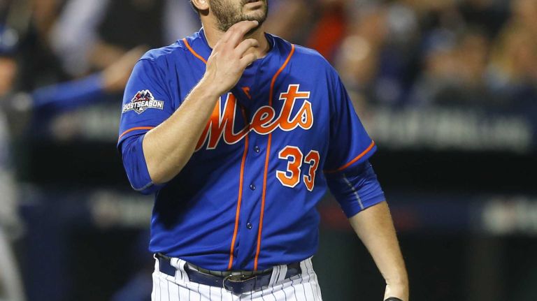 Matt Harvey #33 of the New York Mets walks to the dugout after the second inning against the Los Angeles Dodgers at Citi Field during Game 3 of the NLDS on Friday, Oct. 12, 2015