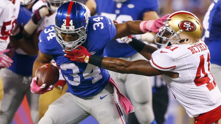 Shane Vereen #34 of the New York Giants runs the ball in the first half against Antoine Bethea #41 of the San Francisco 49ers at MetLife Stadium on Sunday, Oct. 11, 2015 in East Rutherford, N.J.