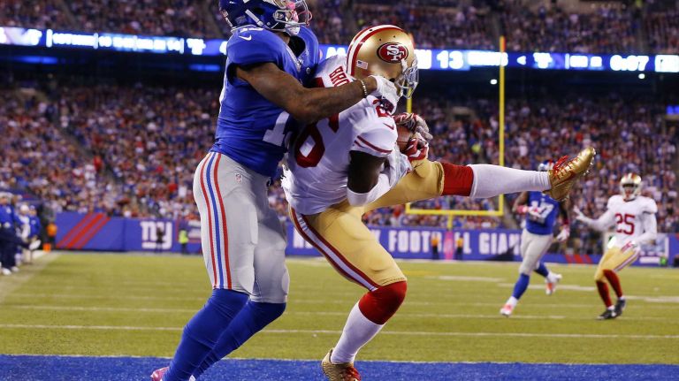 Tramaine Brock #26 of the San Francisco 49ers intercepts a pass in the end zone intended for Odell Beckham #13 of the New York Giants late in the second quarter of a game at MetLife Stadium on Sunday, Oct. 11, 2015 in East Rutherford, N.J.