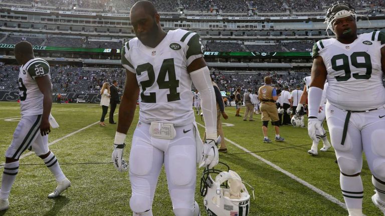 Darrelle Revis #24 of the New York Jets walks off the field with his teammates after a loss against the Philadelphia Eagles at MetLife Stadium on Sunday, Sept. 27, 2015.