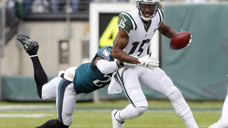 Brandon Marshall #15 of the New York Jets runs a reception in the first half against Malcolm Jenkins #27 of the Philadelphia Eagles during an NFL game at MetLife Stadium on Sept. 27, 2015.