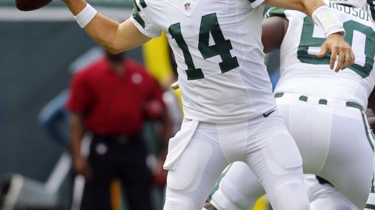 Ryan Fitzpatrick #14 of the New York Jets throws a pass in the first half against the Philadelphia Eagles at MetLife Stadium on Sunday, Sep. 27, 2015 in East Rutherford, New Jersey.