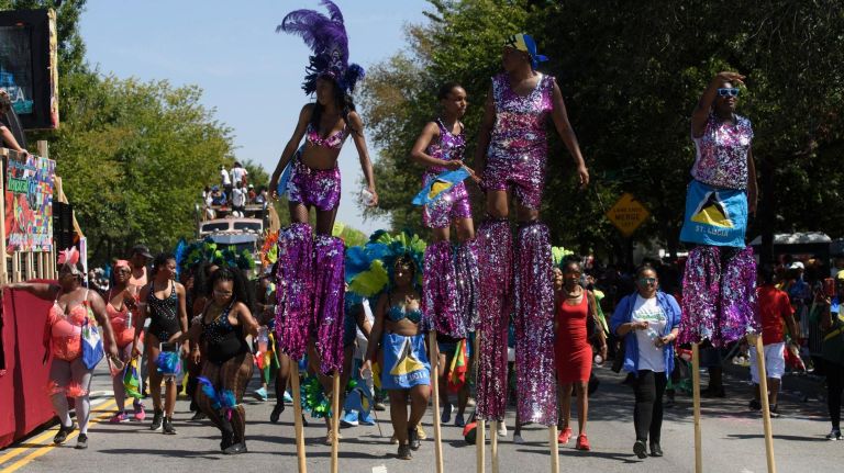 West Indian Day Parade marches through Brooklyn with added security, some violence 1 Policing and safety took center stage at Monday's West Indian Day Parade in Brooklyn, where revelers marched in colorful costumes, some on stilts.