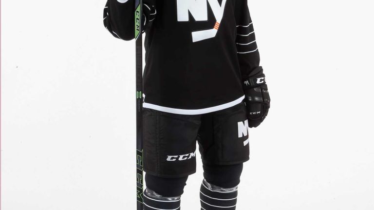 John Tavares #91 of the New York Islanders models the team's third uniform during a photo session on Sept. 15, 2015 at Iceworks in Syosset.
