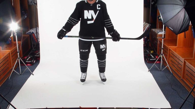 John Tavares #91 of the New York Islanders models the team's third uniform during a photo session on Sept. 15, 2015 at Iceworks in Syosset.