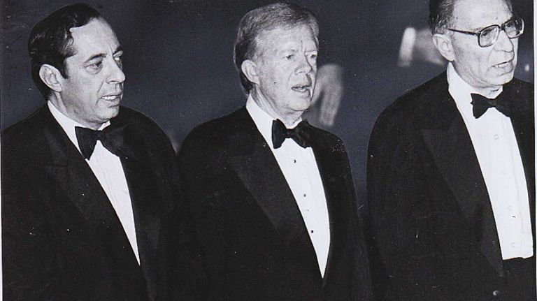Lieutenant Governor Mario Cuomo, former President Jimmy Carter, and Rabbi Israel Moshowitz, at the New York Board of Rabbis Centennial Dinner held at the Waldorf Astoria Hotel. (May 16, 1981)