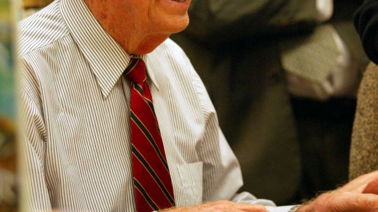 Former President Jimmy Carter signs copies of his novel at the Borders bookstore in lower Manhattan on November 17, 2003. He is the first former president to write a novel. 