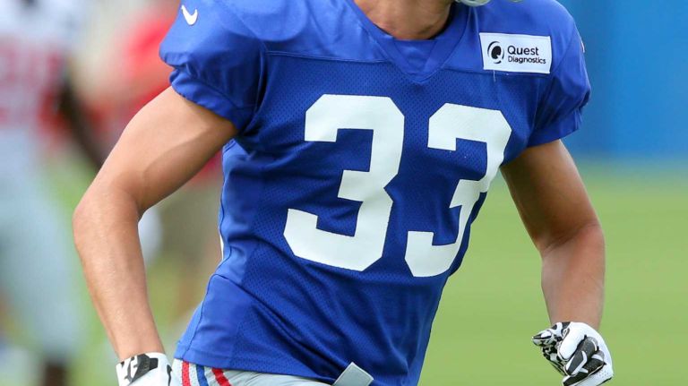 New York Giants safety Justin Halley runs a play during training camp at the Quest Diagnostics Training Center in East Rutherford, N.J., on Saturday, Aug. 8, 2015.