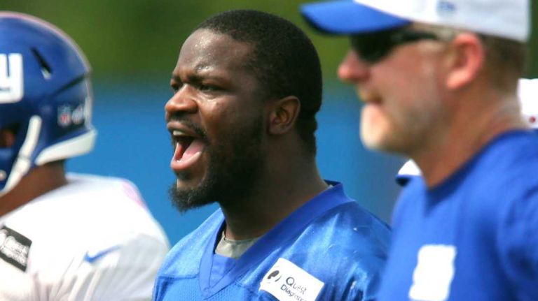 New York Giants linebacker Jameel McClain shouts from the sidelines during training camp at the Quest Diagnostics Training Center in East Rutherford, N.J., on Saturday, Aug. 8, 2015.