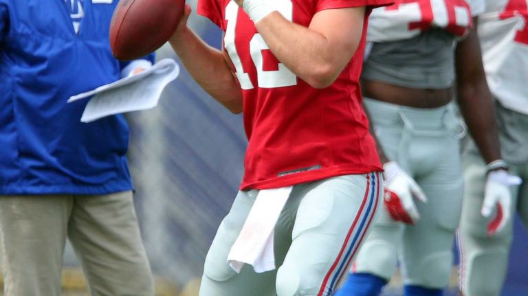 New York Giants quarterback Ryan Nassib drops back to pass during training camp at the Quest Diagnostics Training Center in East Rutherford, N.J., on Saturday, Aug. 8, 2015.