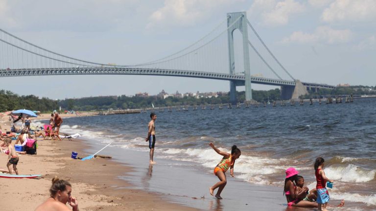 A view of the Verrazano-Narrows Bridge from the beach along Father Capodanno Boulevard in Dongan Hills, Staten Island, on Saturday, July 25, 2015.