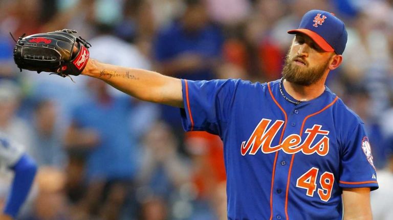 Jonathon Niese of the Mets looks on after surrendering a third-inning two-run home run against Yasiel Puig of the Los Angeles Dodgers at Citi Field on Friday, July 24, 2015.