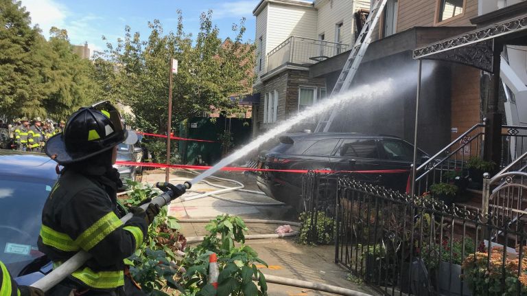 Four people were injured Monday afternoon when a house exploded in Brooklyn, the FDNY said.