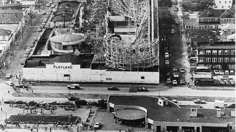 An aerial view looking north of Rockaway Beach at Beach 98th Street shows Rockaways' Playland. (July 20, 1980)