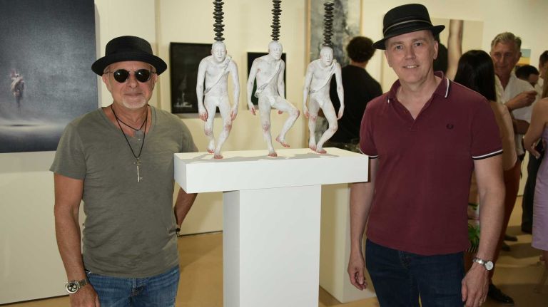 Jeff Illions and Peter Drake pose with Chie Shimizu's 