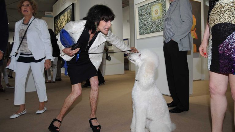Susan Fram and her dog Stella at the Art Southampton VIP first view & VIP preview to benefit Southampton Hospital & Parrish Art Museum in Water Mill, Thursday, July 9, 2015. The art show runs from July 9 through July 13.