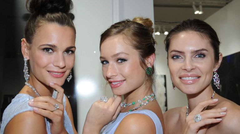 Graff Diamonds models Anita Hodosi, left, Ashlen Alexandra and Mila Bernote, at the Art Southampton VIP first view & VIP preview to benefit Southampton Hospital & Parrish Art Museum in Water Mill, Thursday, July 9, 2015. The art show runs through July 13. 