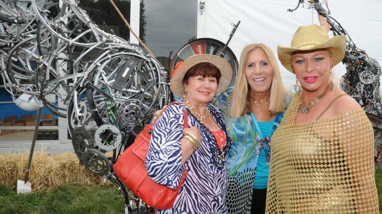 Art lovers, from left to right, Basia Zieba, Angela Stern and Janine Schmitt attend the Art Southampton VIP first view & VIP preview to benefit Southampton Hospital & Parrish Art Museum in Water Mill, Thursday, July 9, 2015. The art show runs from July 9 through July 13.